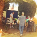 Members of the Ocean Beach Town Council putting in some elbow grease.