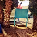 AFTER - fresh coat of Caribbean Blue paint from OB Hardware, beautified grate, trees pruned back, and trash removed.